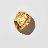 Golden nugget, rough textured photo