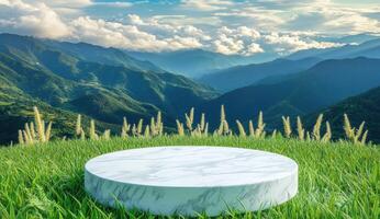 Elevated white marble podium amidst lush green grass, mountain backdrop photo