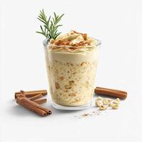 Creamy oatmeal topped with whipped cream and cinnamon photo