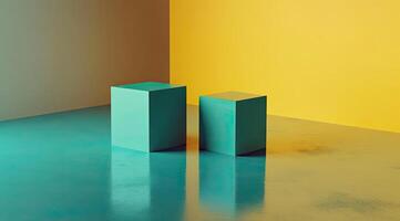 Two teal cubes on a reflective surface, angled in a corner with yellow and beige walls photo