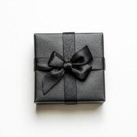 Black gift box with satin ribbon bow photo