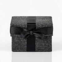 Square gift box with black ribbon bow photo