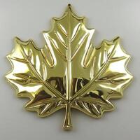 Polished gold maple leaf decorative accent photo