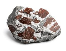 Rough rock specimen with reddish-brown and gray patterns photo