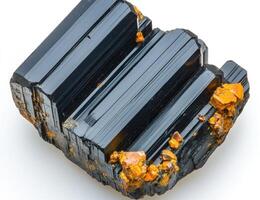 Dark mineral specimen with orange inclusions photo