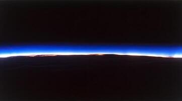 Cosmic dawn view of Earth's horizon photo