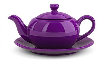 Purple teapot on a matching saucer photo