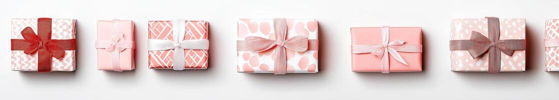 Stacked presents in various shades of pink photo