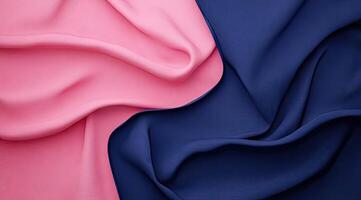 Two draped fabrics, pink and navy blue photo