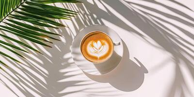 A cup of latte art in the sunlight photo