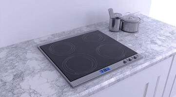 Modern cooktop on a marble countertop. Four burners, controls, and stainless steel pots photo