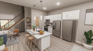 Modern open-plan kitchen with island, living area, and stairs photo
