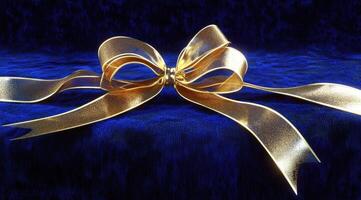 Luxurious gold ribbon bow on deep blue velvet photo