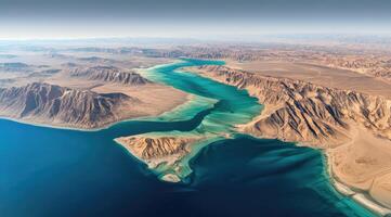 Aerial view of a desert coastline with turquoise waters photo