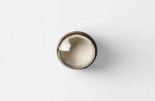 Fresh coconut half, top view photo