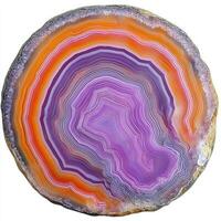 Circular slice of banded agate, vibrant colors photo
