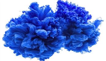 Deep blue ink swirling in abstract forms photo