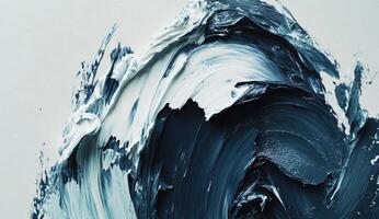 Abstract paint swirls of white and dark blue photo