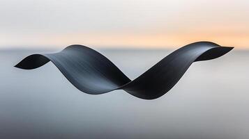 Minimalist Abstract Sculpture Against a Gradient Backdrop at Sunset photo