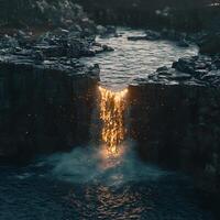 Illuminated Fiery Waterfall Flowing Over a Cliff at Twilight photo