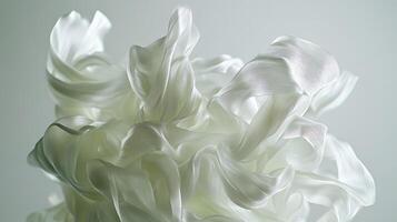Elegant Abstract Form Resembling Floating Lightweight Ribbons in Soft White Tones photo