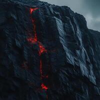 Dynamic Flowing Lava Streams on a Rugged Cliffside Under a Clouded Sky photo