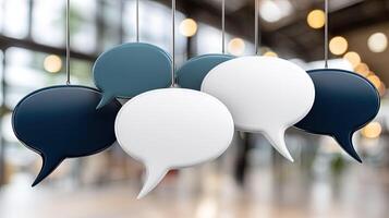 Four speech bubbles hanging from strings photo