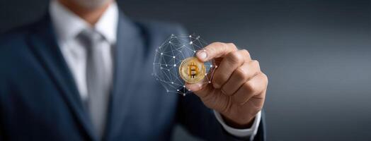Bitcoin business man holding bitcoin network concept photo