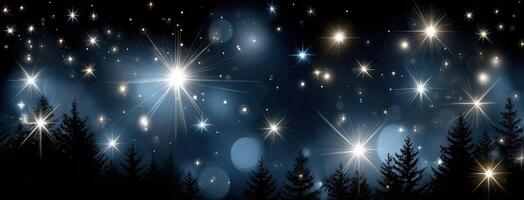 A night sky with stars and trees photo