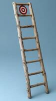 A ladder with a target on top of it photo