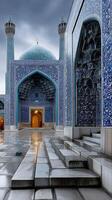 A blue mosque with a blue dome and steps photo