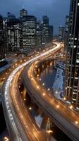 A city street with traffic lights and a highway photo