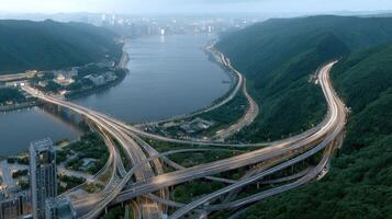 An aerial view of a highway overpass and river photo