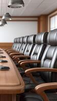 A conference room with leather chairs and a phone photo