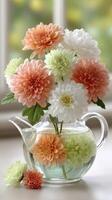 A glass vase filled with flowers photo