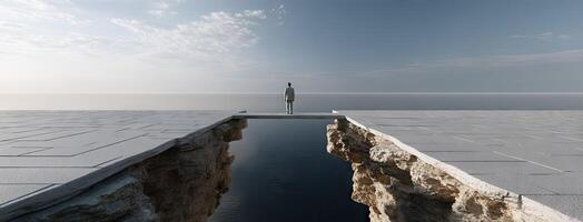 A man standing on a bridge over a large gap photo