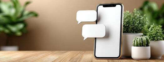 Smartphone with speech bubbles on wooden table photo