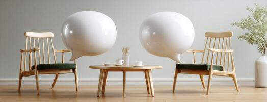 Two chairs and a table with two large balloons photo