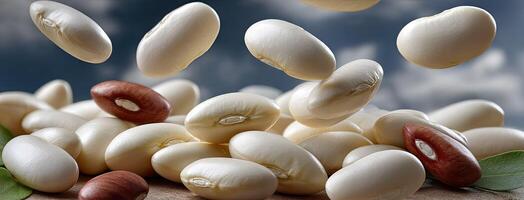 A bunch of beans and nuts on a table photo