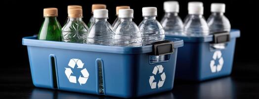 Three bottles of water in a blue recycling bin photo