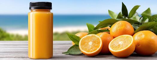 A bottle of orange juice sitting next to a bunch of oranges photo