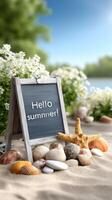 Hello summer sign on the beach with shells and flowers photo