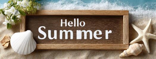 Hello summer sign on the sand photo