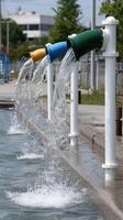 A water fountain with water coming out of it photo