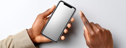 Hands holding an iphone xr on a white background photo
