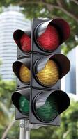A traffic light with a green light and red light photo
