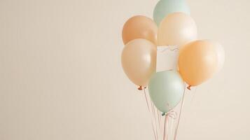 Colorful balloons with a blank card waiting for a special message in a festive setting photo