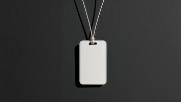 Blank tag hanging on a black backdrop for custom labeling or branding purposes photo