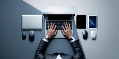 Professional workspace setup featuring modern devices and a focused individual engaged in productivity photo