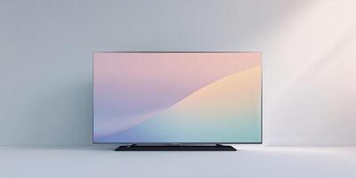 Modern television with a sleek design displaying a soft gradient background in a minimalistic setting photo